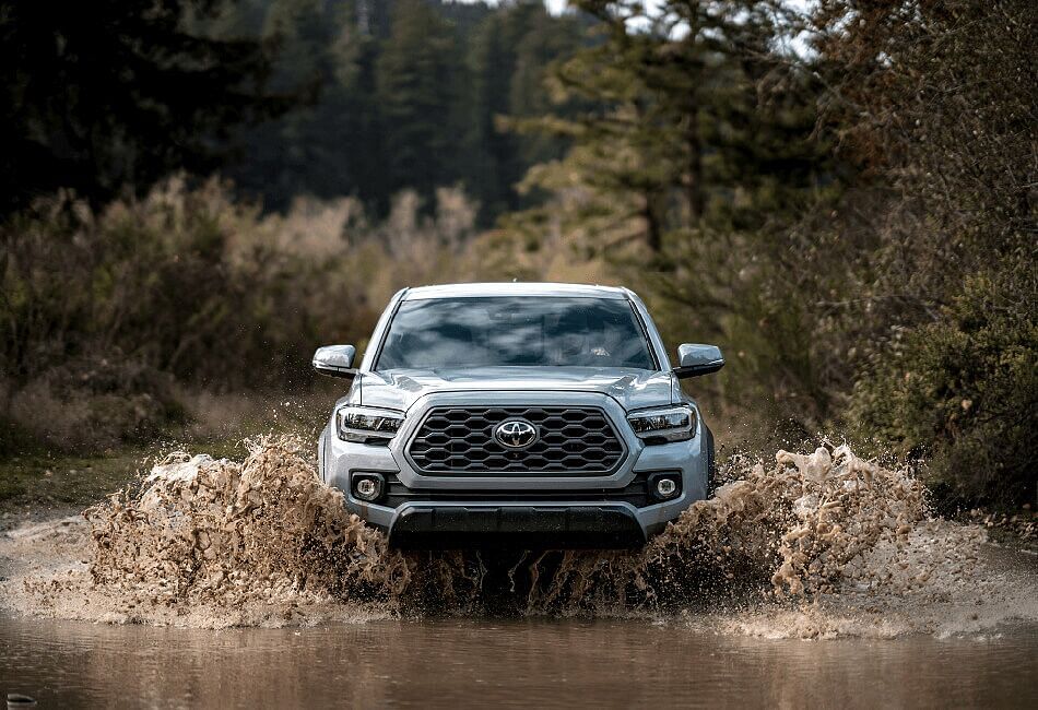 2020 Toyota Tacoma Offroad driving through a river